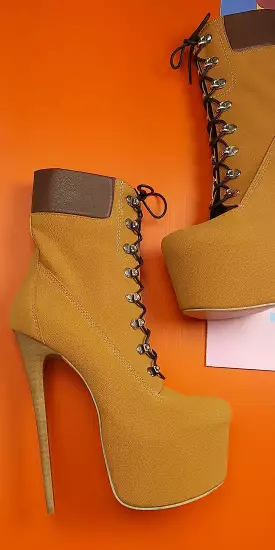 Camel high heel platform boots with lace-up and timber style.