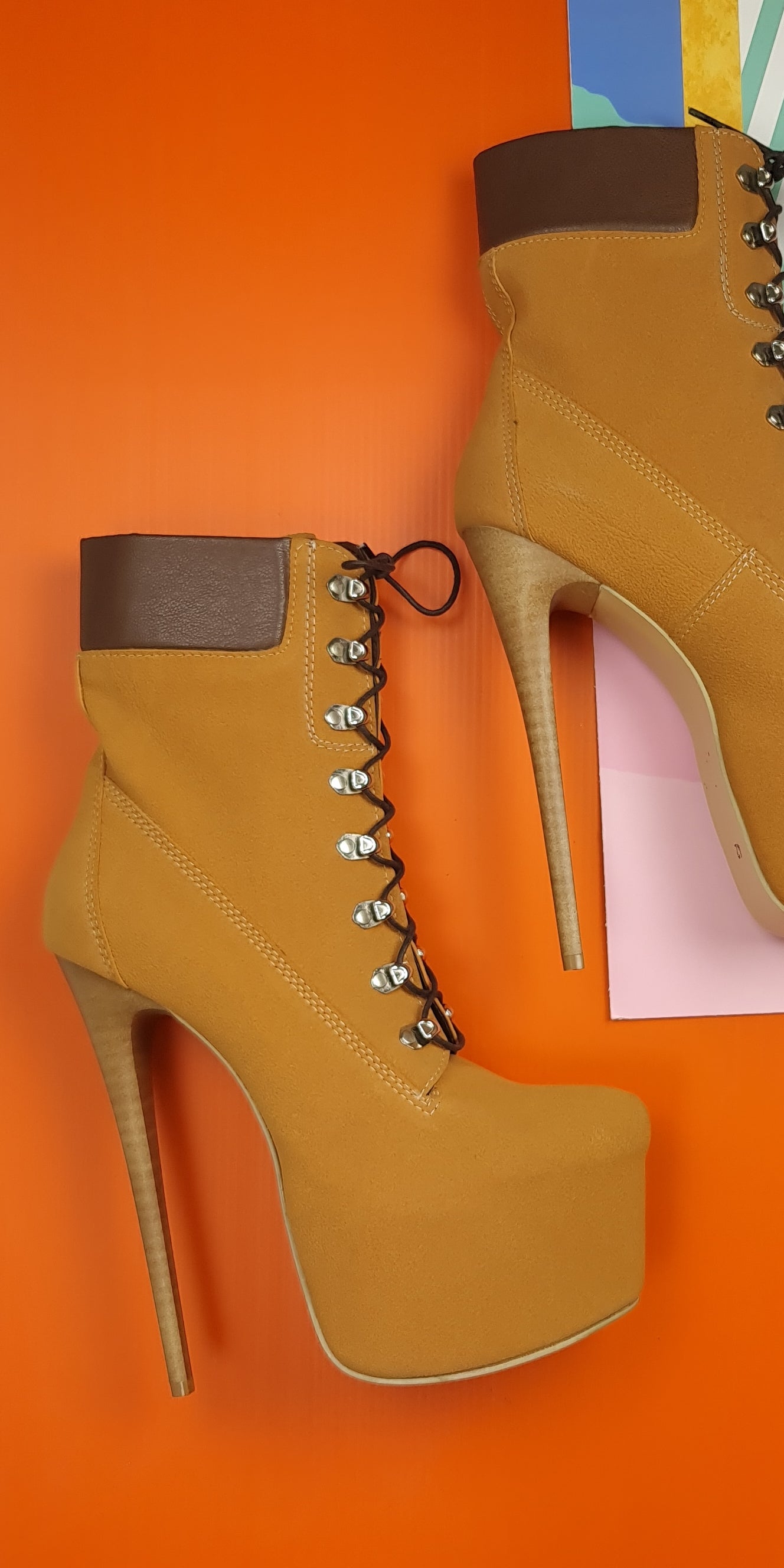 Camel high heel platform boots with lace-up and timber style.