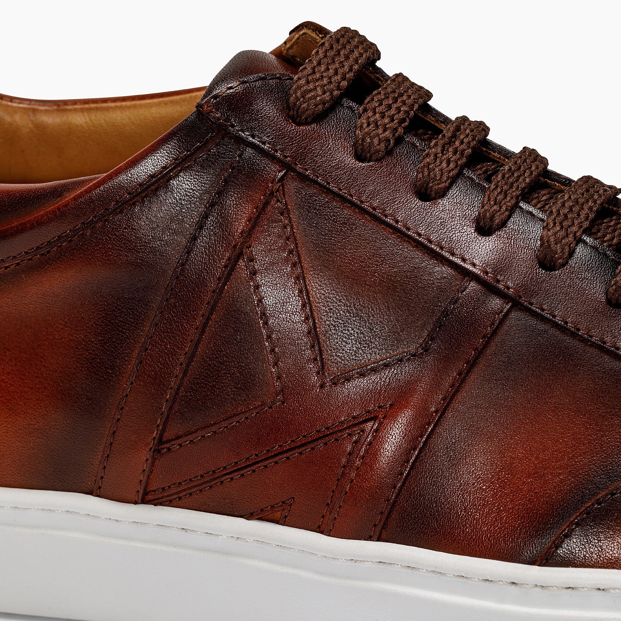 Crust leather running sneakers.