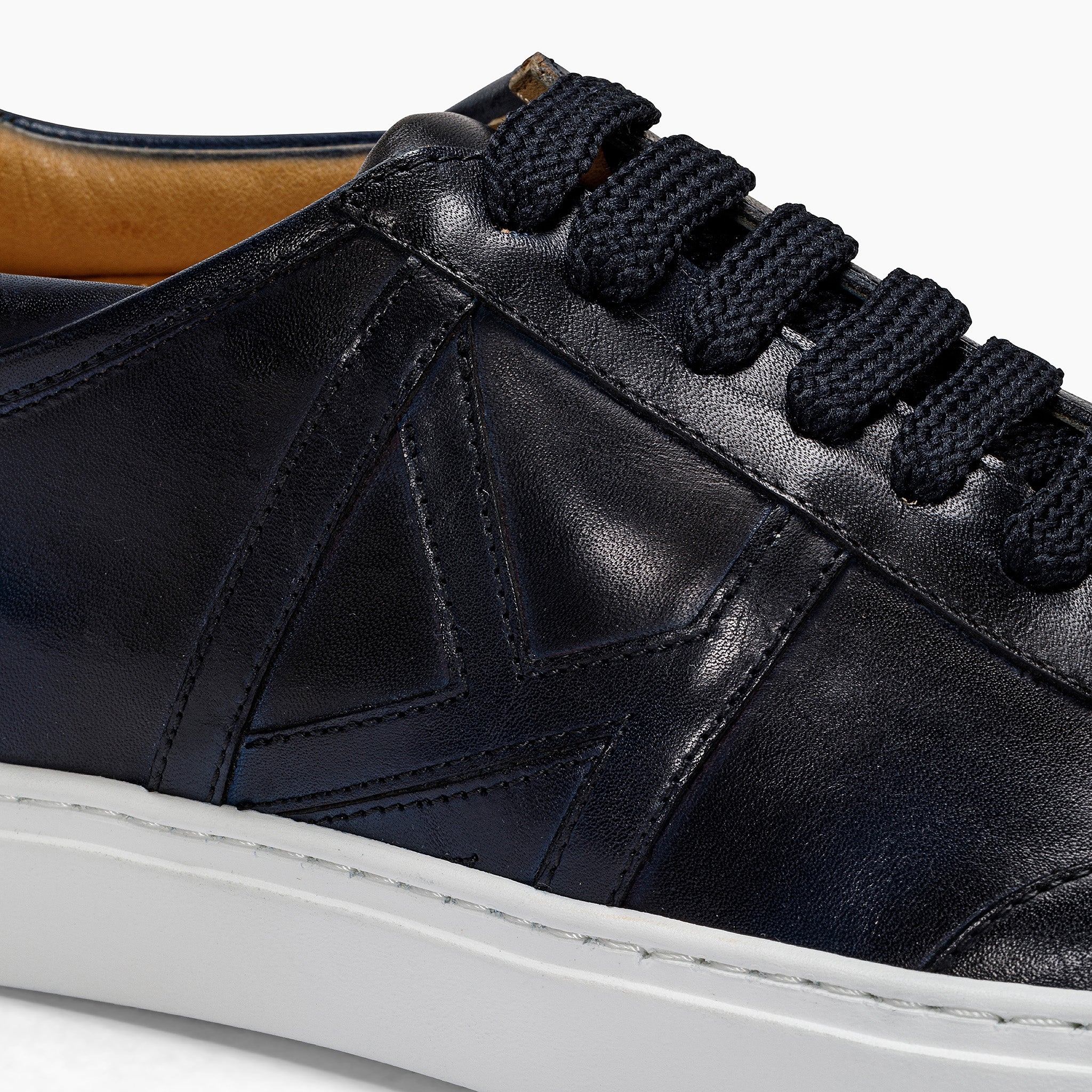 Crust leather running sneakers.