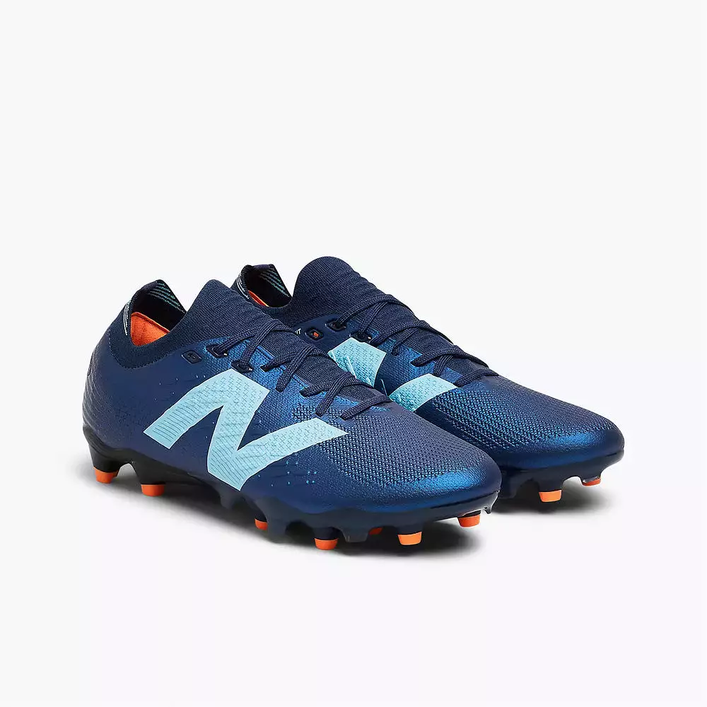 New Balance Tekela Pro Low V4+ FG Football Boots, Navy/Sky Blue/Hot Mango.