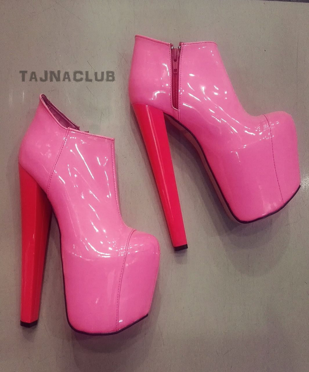 Pink platform ankle boots.