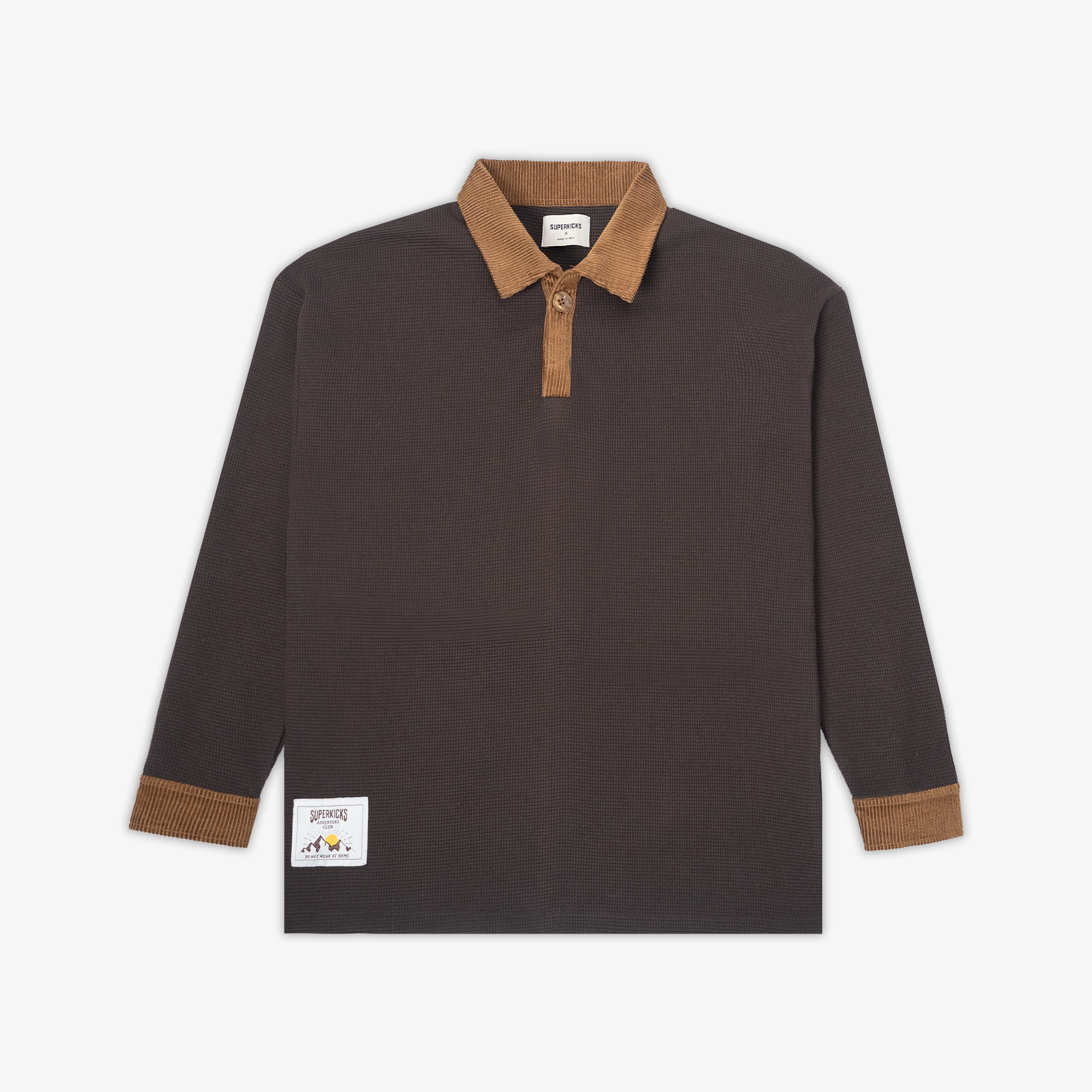 Polo shirt in brown with corduroy details - result 1: Waffle knit polo with corduroy accents in brown.