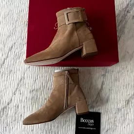 Roger Vivier buckled suede ankle boots.