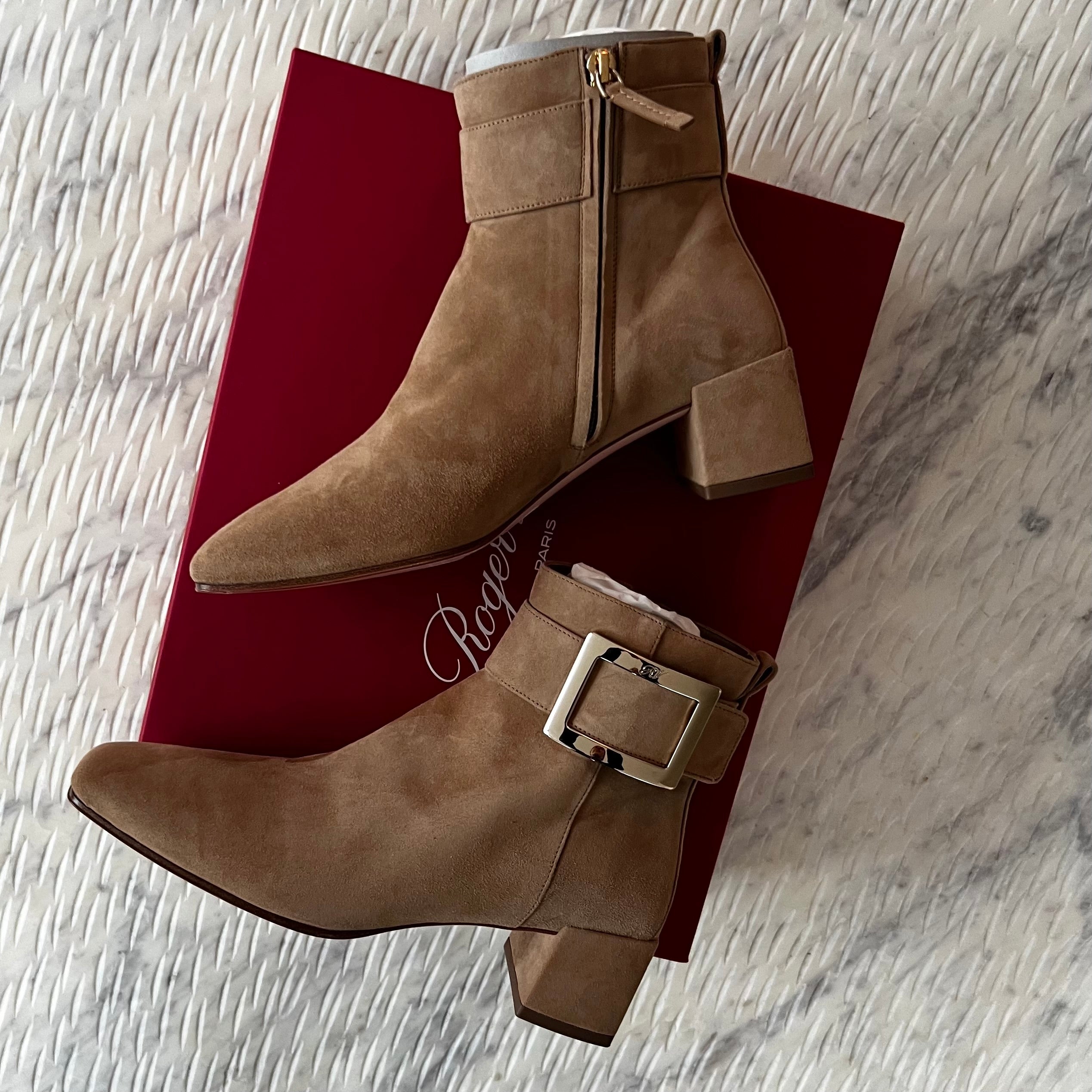 Roger Vivier buckled suede ankle boots.