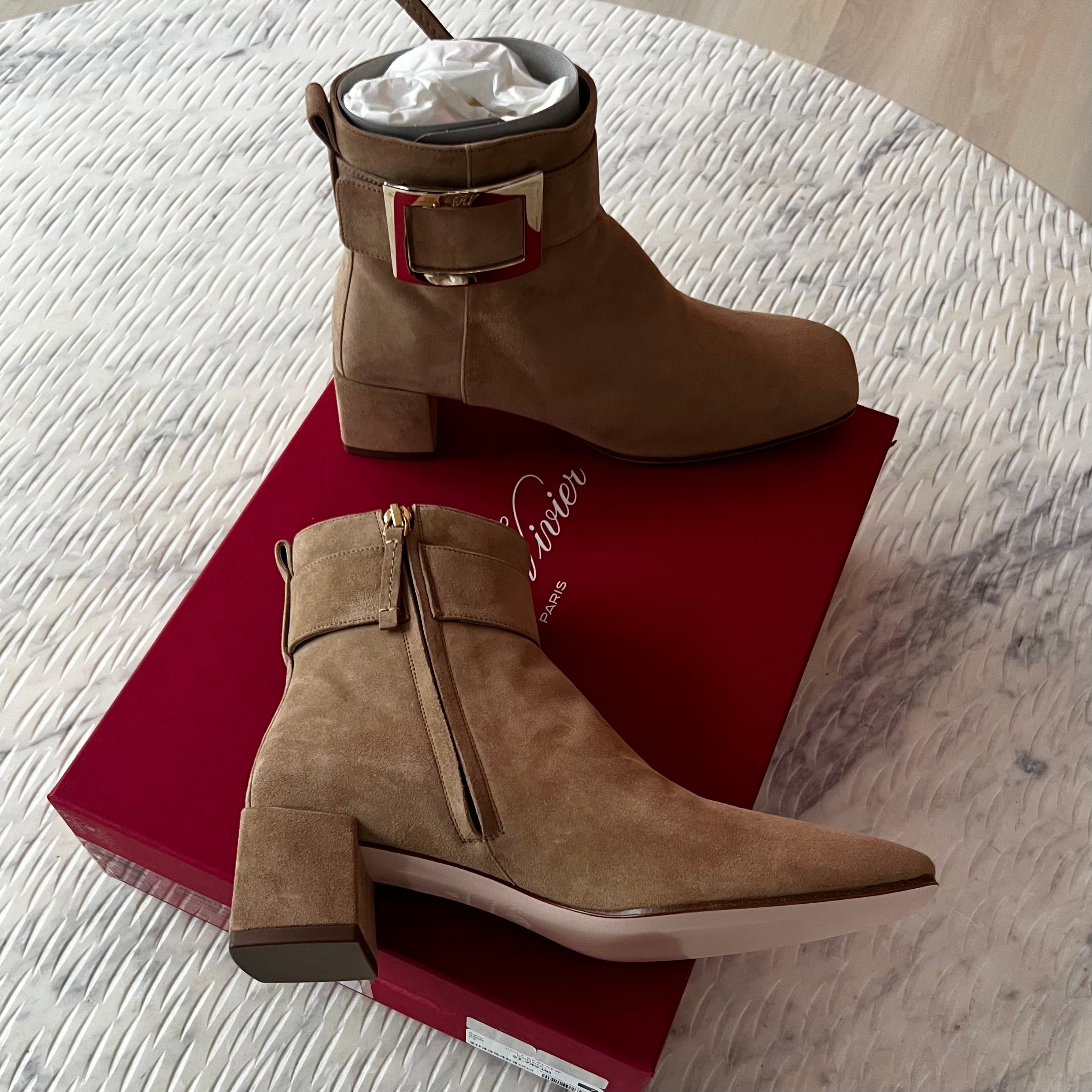 Roger Vivier buckled suede ankle boots.