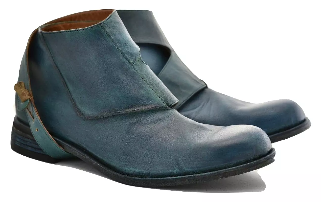 Turquoise horse straparound boot.