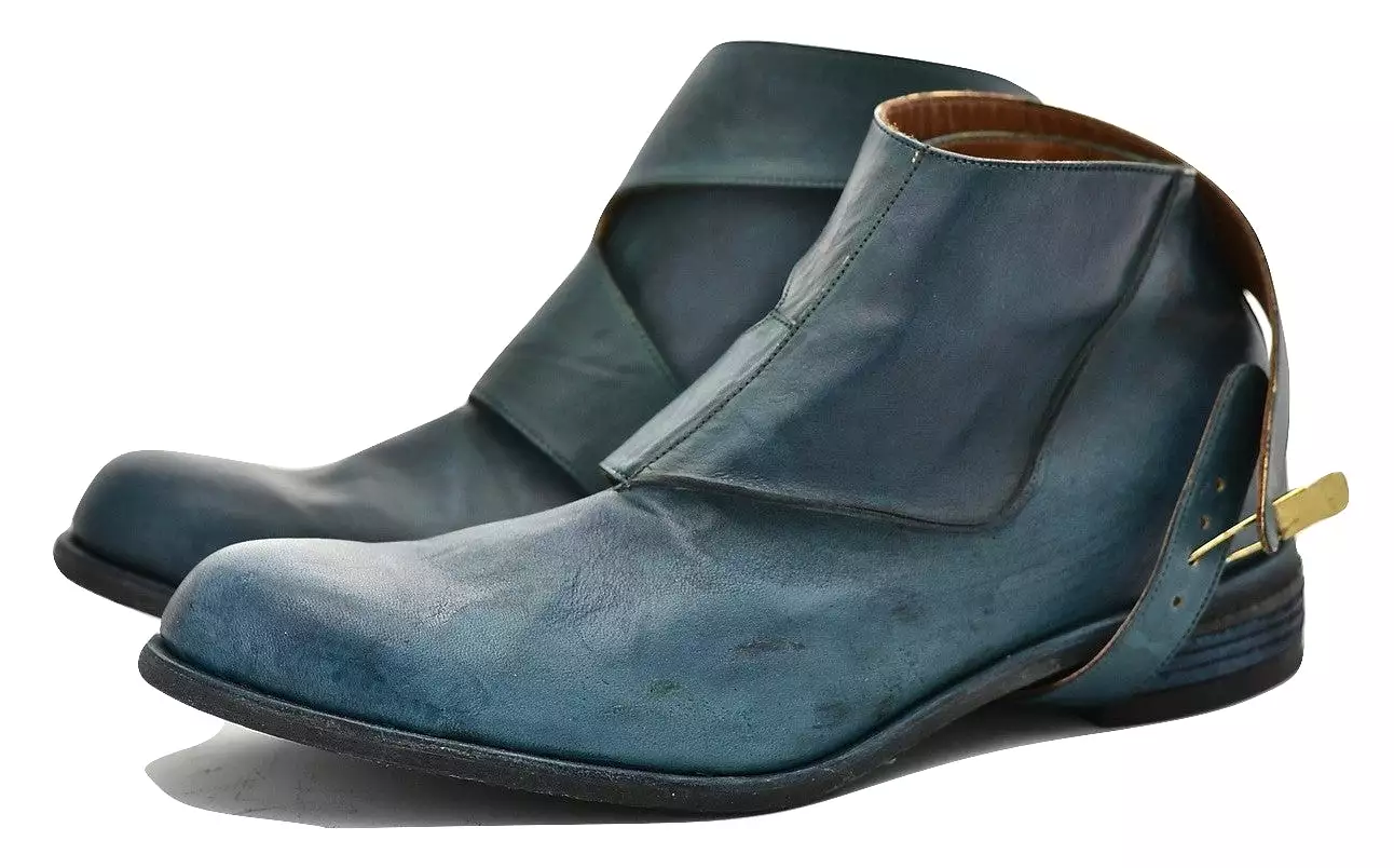 Turquoise horse straparound boot.