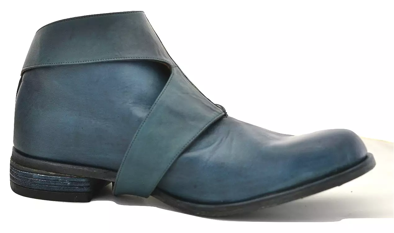 Turquoise horse straparound boot.