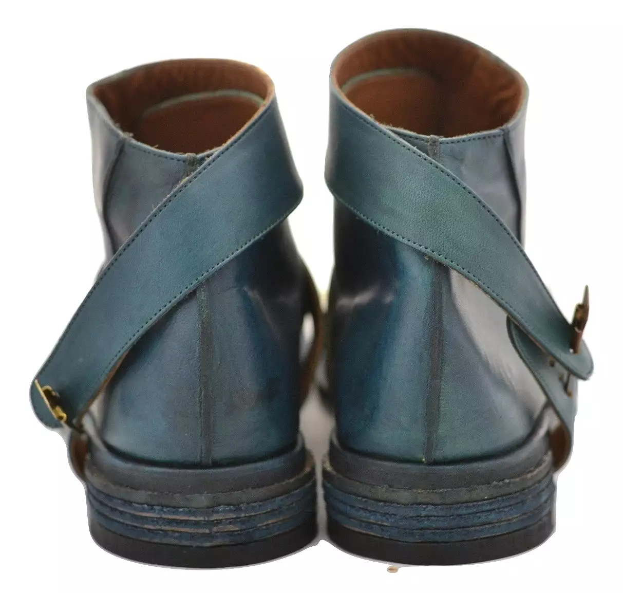 Turquoise horse straparound boot.