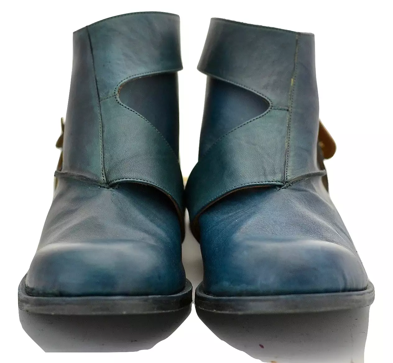 Turquoise horse straparound boot.