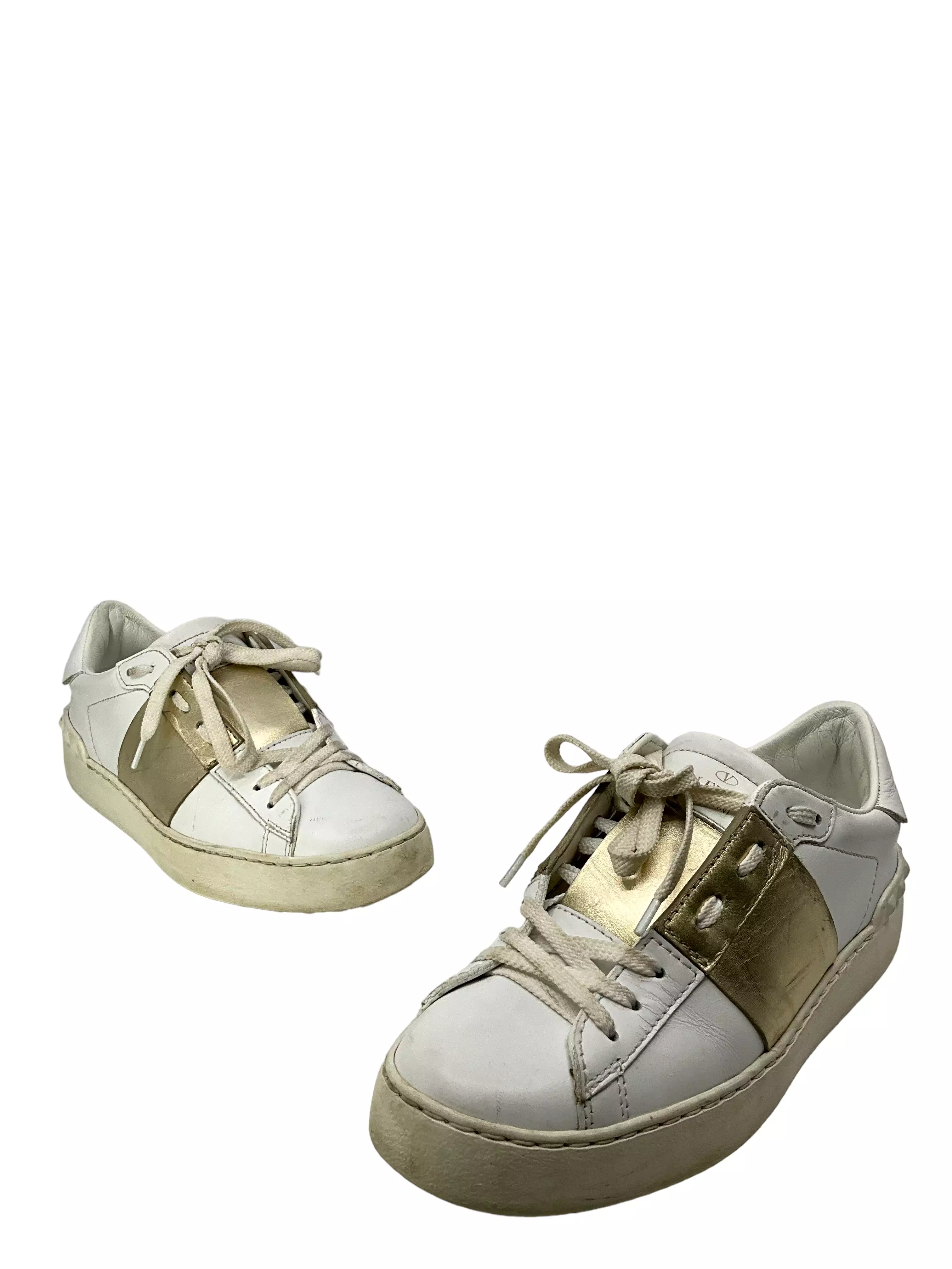 Valentino Garavani Rockstud white gold leather sneakers size 6.5 for sale.