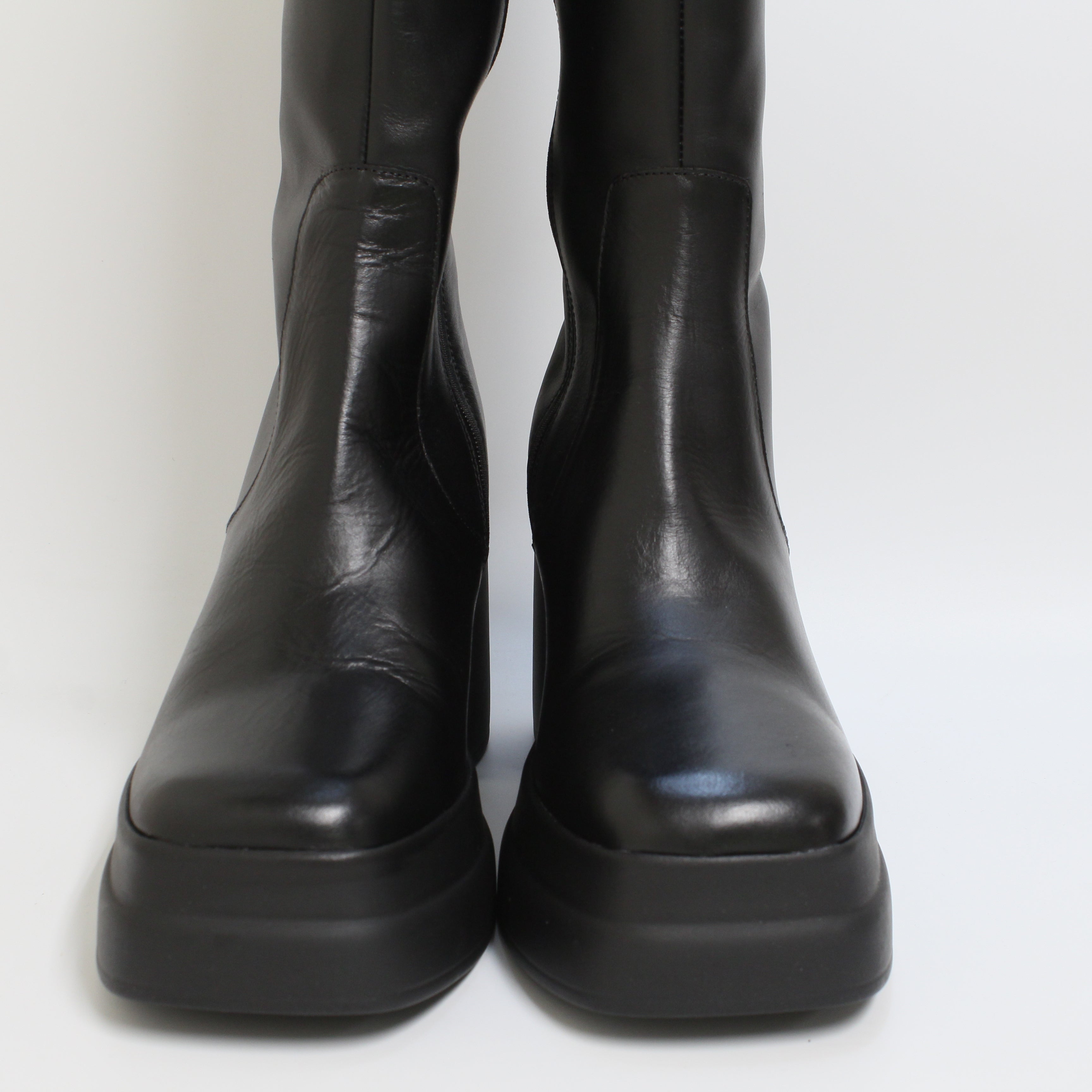 Women's black leather office platform boots