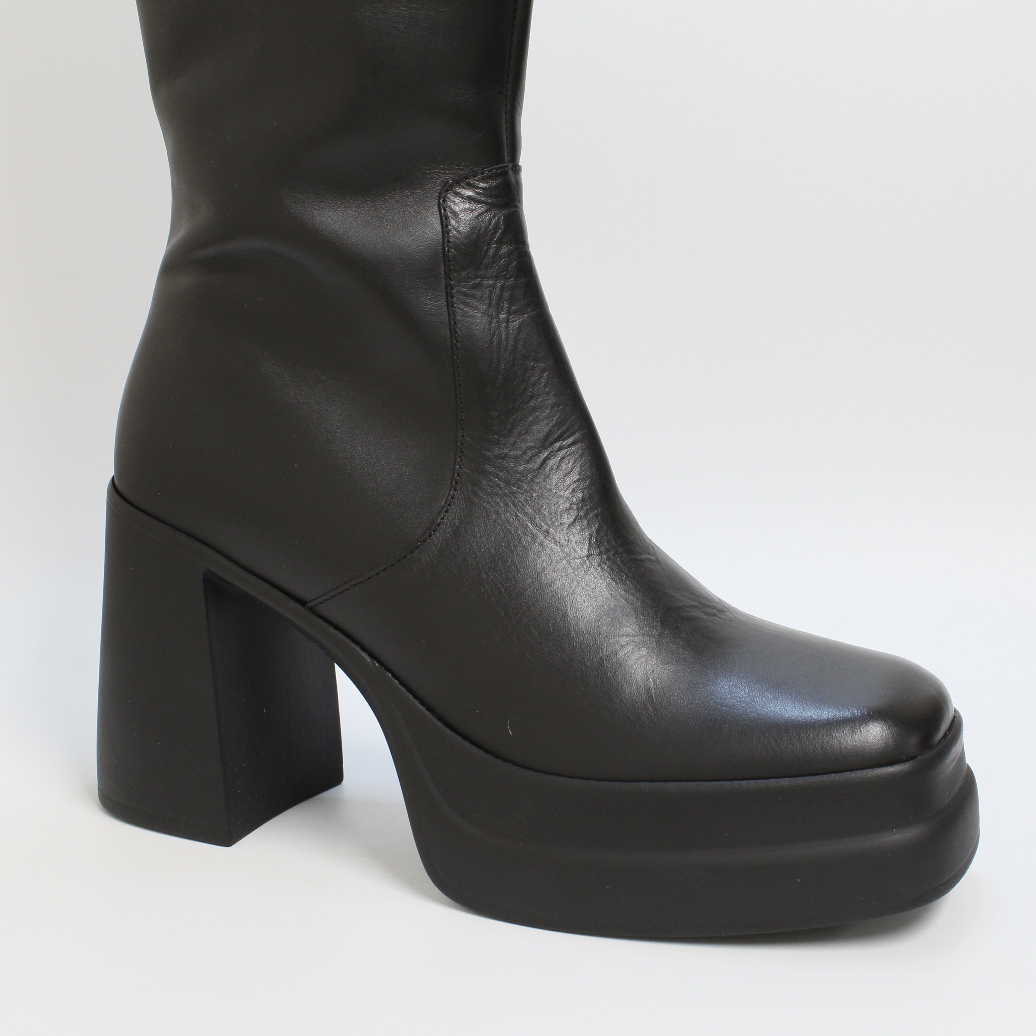 Women's black leather office platform boots